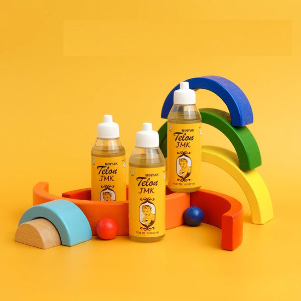 JMK Minyak Telon Bayi 100ml meringankan gejala perut kembung masuk angin